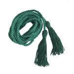 A green braided cord coiled in a pile with two tassels on each end.