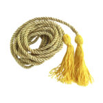 A yellow braided cord coiled in a pile with two tassels on each end.
